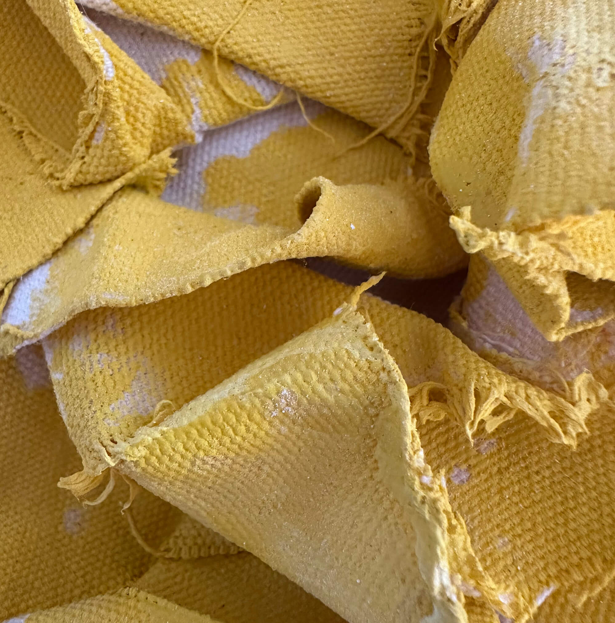 Detail of MINI YELLOW showing expressive brushwork and texture on paper